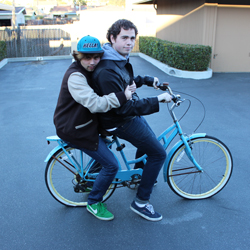 Bobby and Tyler on a bike